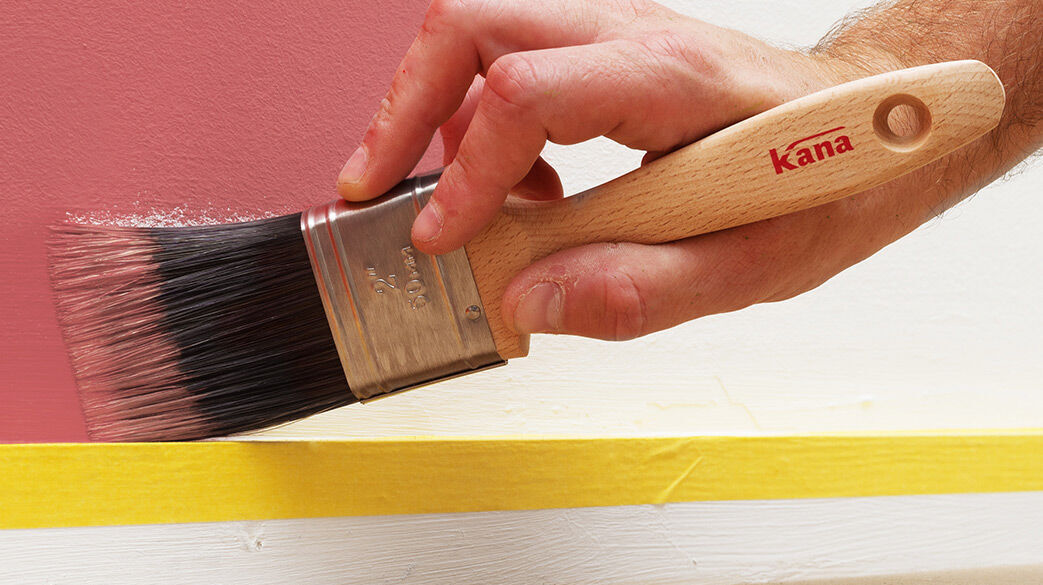 Paint brush from the Kana brand is used to paint above skirting board.