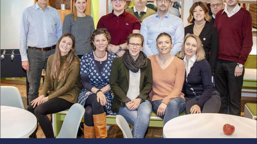 Group photo of Storch-Ciret team members at a summit.